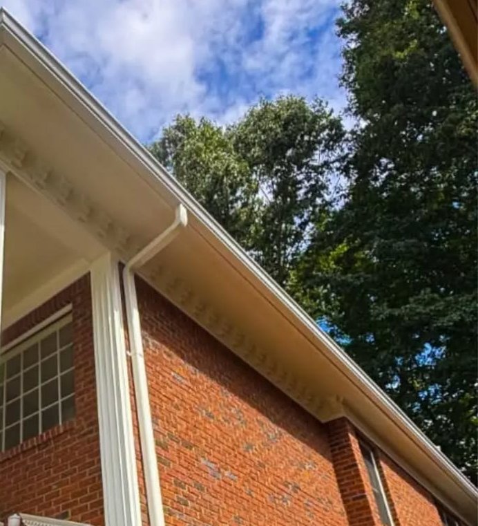 New gutter and downspout on a brick home — Diaz project