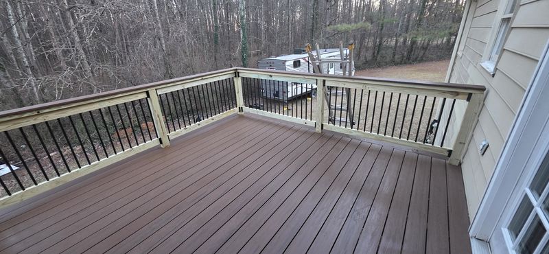 New deck surface with railing — Diaz deck project